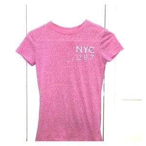 Pink shirt with white NYC embroidery
